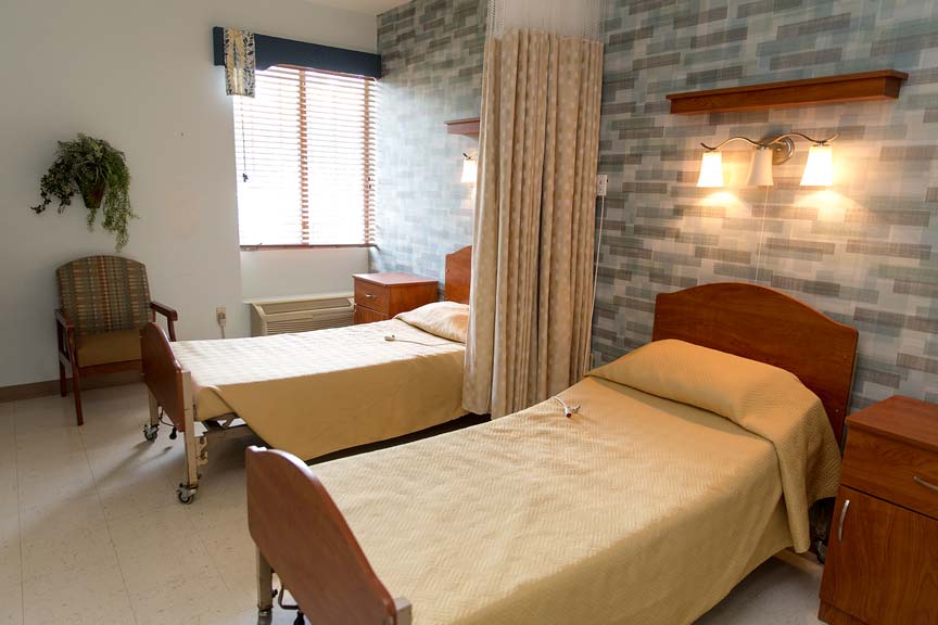 An interior shot of a bedroom at the Du Quoin Nursing and Rehabilitation Center facility, from the Du Quoin Gallery.