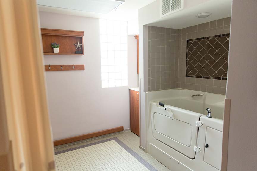 An interior shot of a walk-in bathtub/shower at the Du Quoin Nursing and Rehabilitation Center facility, from the Du Quoin Gallery.